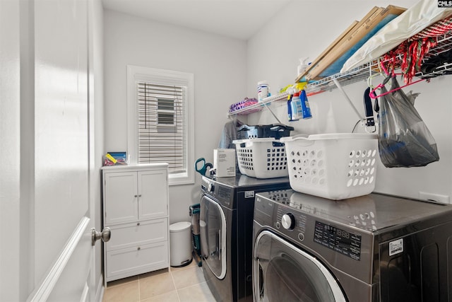 214 Chapin Brook Ct, Chapin, SC 29036 - washroom featuring washing machine and clothes dryer, cabinet space, and light tile patterned floors