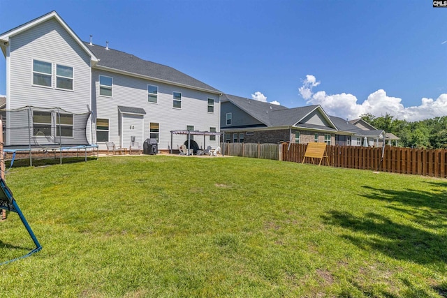 214 Chapin Brook Ct, Chapin, SC 29036 - back of property featuring a trampoline