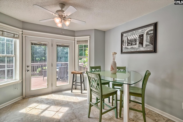 4 Beckworth Ct, Irmo, SC 29063 - dining area with plenty of natural light, a textured ceiling, a ceiling fan, and tile patterned flooring