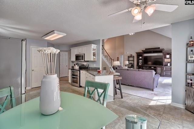 4 Beckworth Ct, Irmo, SC 29063 - dining space featuring ceiling fan, stairway, and a textured ceiling