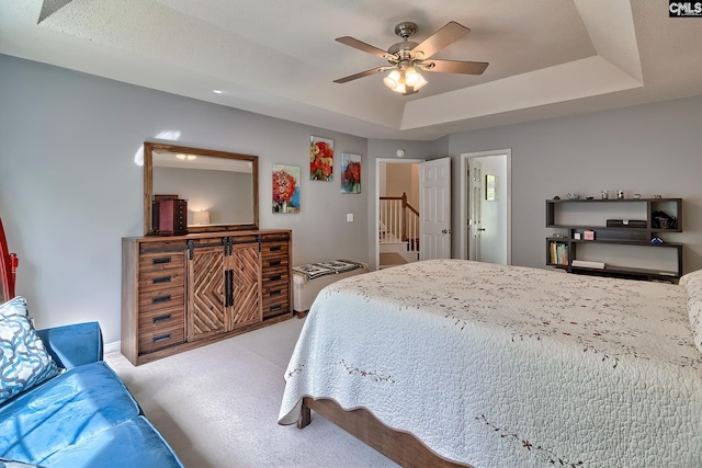 4 Beckworth Ct, Irmo, SC 29063 - carpeted bedroom featuring a tray ceiling and a ceiling fan