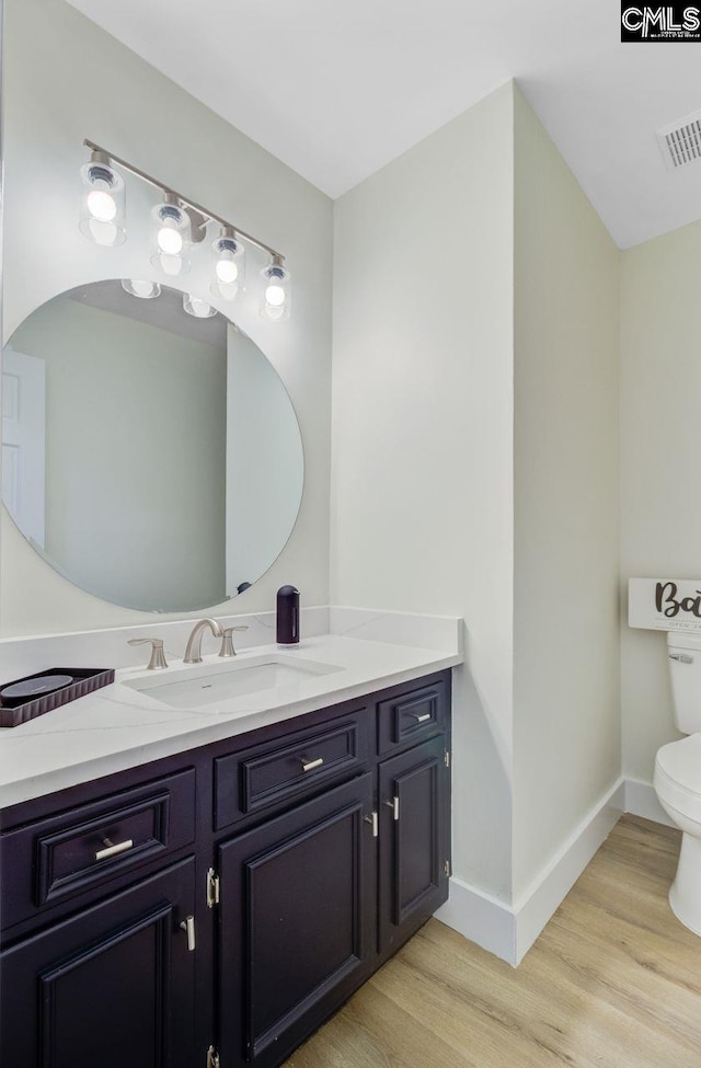 303 High Grove Rd, Summerville, SC 29485 - bathroom featuring wood finished floors and vanity
