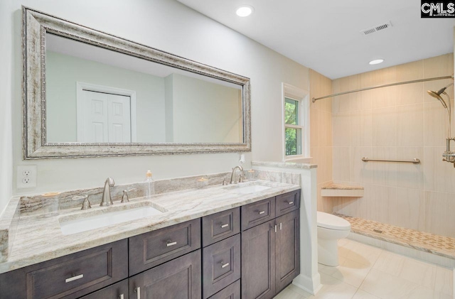 303 High Grove Rd, Summerville, SC 29485 - full bathroom with double vanity, tiled shower, tile patterned flooring, and recessed lighting