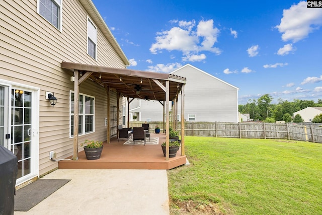 512 Eagles Rest Dr, Chapin, SC 29036 - fenced backyard with ceiling fan, a patio, and outdoor dining area