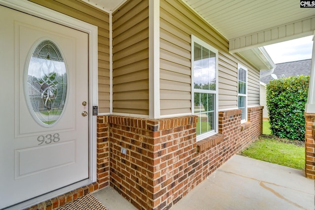 938 Farnsworth Dr, Hopkins, SC 29061 - property entrance featuring brick siding and a porch