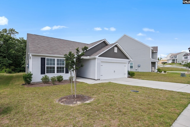 320 Sundew Rd, Elgin, SC 29045 - view of front facade featuring concrete driveway, a garage, and a front lawn