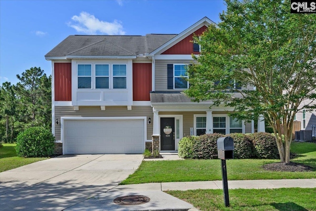 620 Blue Ledge Cir, Lexington, SC 29072 - view of front of home featuring an attached garage, driveway, a front yard, and stone siding