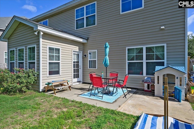 620 Blue Ledge Cir, Lexington, SC 29072 - rear view of house with a patio and a lawn