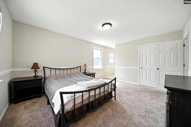 224 Ashton Cir, Lexington, SC 29073 - bedroom featuring carpet flooring, a closet, and a textured ceiling