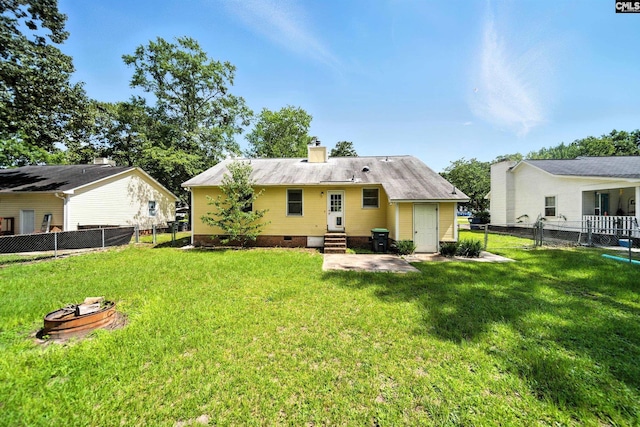 224 Ashton Cir, Lexington, SC 29073 - back of house with entry steps, a chimney, a fenced backyard, crawl space, and a patio area