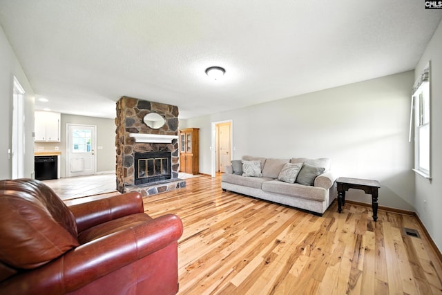 224 Ashton Cir, Lexington, SC 29073 - living area featuring a fireplace and light wood-type flooring