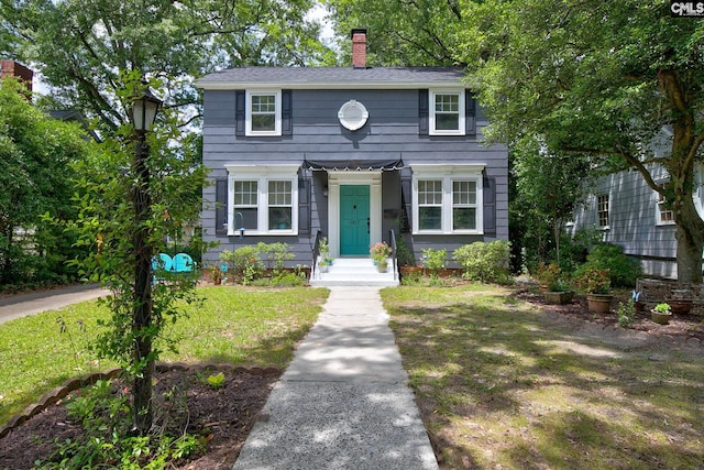 2817 Duncan St, Columbia, SC 29205 - view of front facade with a chimney and a front yard
