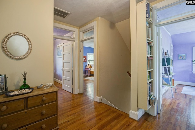 2817 Duncan St, Columbia, SC 29205 - corridor with an upstairs landing, dark wood finished floors, and lofted ceiling