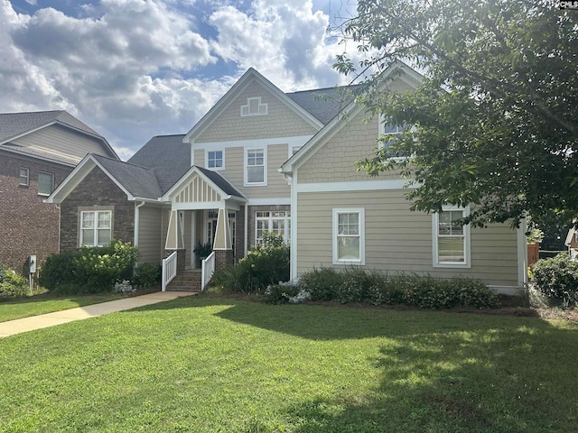 100 Julia Ct, Lexington, SC 29072 - craftsman-style house with a front yard and stone siding