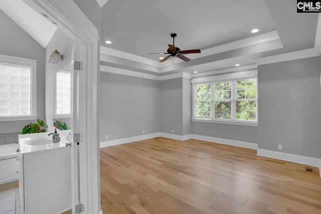 100 Julia Ct, Lexington, SC 29072 - spare room with a ceiling fan, light wood-type flooring, ornamental molding, a tray ceiling, and recessed lighting