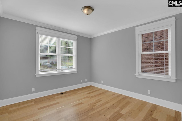100 Julia Ct, Lexington, SC 29072 - spare room with ornamental molding and wood finished floors