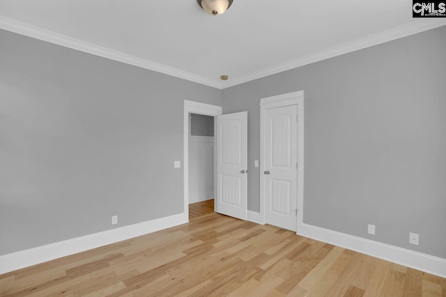 100 Julia Ct, Lexington, SC 29072 - unfurnished bedroom featuring light wood-style flooring and crown molding