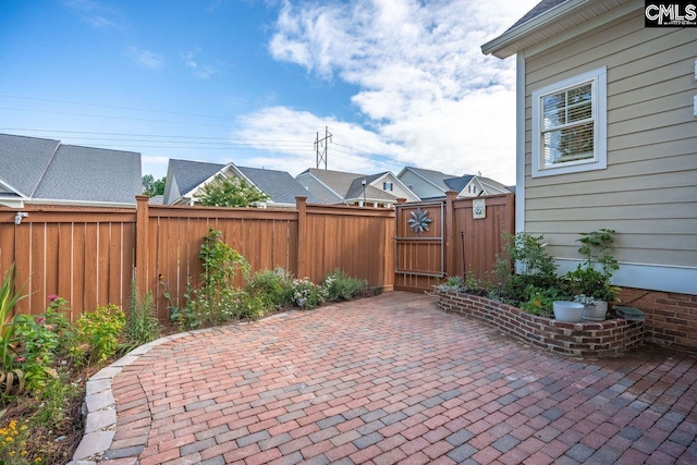 100 Julia Ct, Lexington, SC 29072 - fenced backyard featuring a patio and a gate
