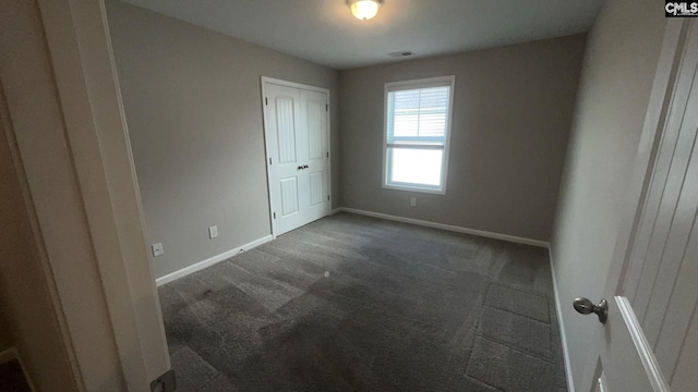 1020 Winter Way, Lexington, SC 29073 - unfurnished bedroom with dark carpet and a closet