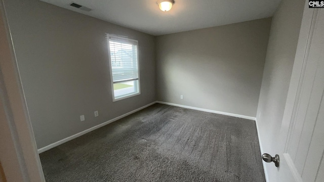 1020 Winter Way, Lexington, SC 29073 - spare room with dark carpet and baseboards