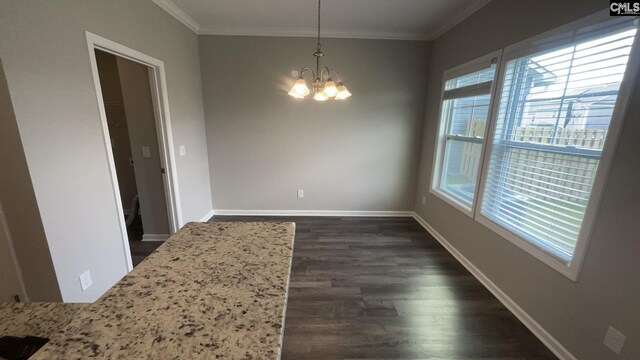 1020 Winter Way, Lexington, SC 29073 - unfurnished dining area featuring ornamental molding, a chandelier, and dark wood-type flooring