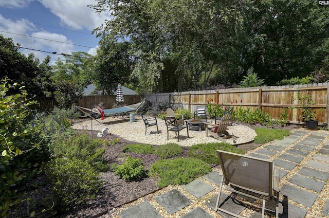 3722 Heyward St, Columbia, SC 29205 - fenced backyard with a fire pit and a patio area