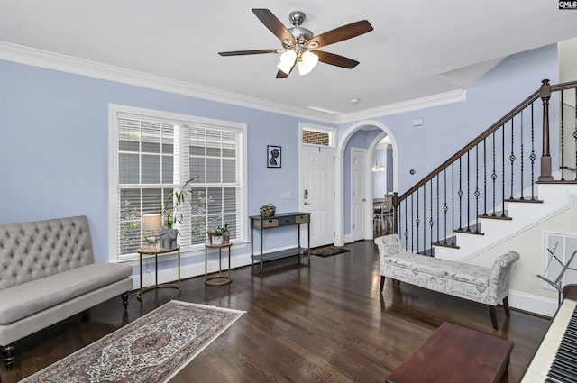 3722 Heyward St, Columbia, SC 29205 - foyer entrance with a ceiling fan, ornamental molding, wood finished floors, arched walkways, and stairs