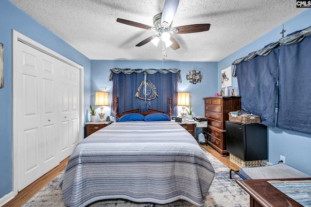3204 Windmill Rd, Leesville, SC 29070 - bedroom with wood finished floors, a textured ceiling, a closet, and ceiling fan