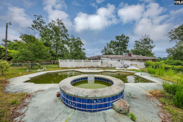 3204 Windmill Rd, Leesville, SC 29070 - view of pool featuring a fenced backyard and a pool with connected hot tub