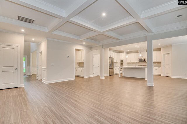 20 Belfast Ct, North Augusta, SC 29860 - unfurnished living room with light wood-style flooring, beam ceiling, coffered ceiling, and crown molding