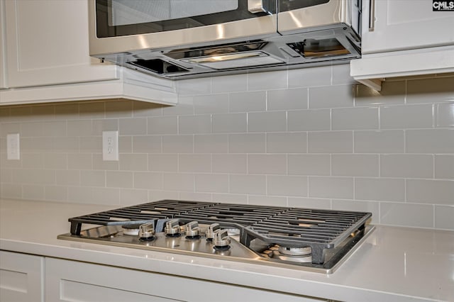 20 Belfast Ct, North Augusta, SC 29860 - kitchen view of appliances with stainless steel finishes, white cabinets, backsplash, and light countertops