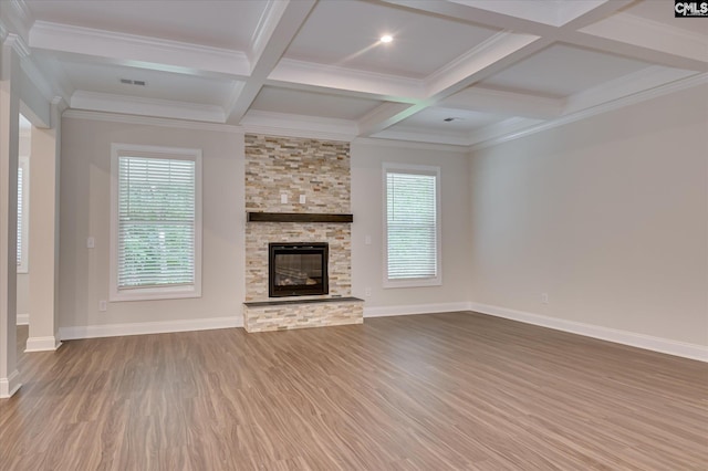 20 Belfast Ct, North Augusta, SC 29860 - unfurnished living room with wood finished floors, coffered ceiling, beamed ceiling, a stone fireplace, and crown molding
