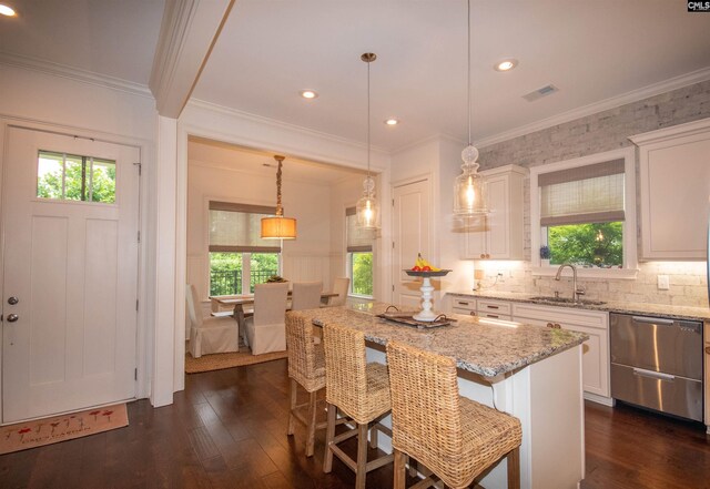 221 Coldwater Xing, Lexington, SC 29072 - kitchen featuring dishwasher, healthy amount of natural light, white cabinetry, crown molding, and recessed lighting