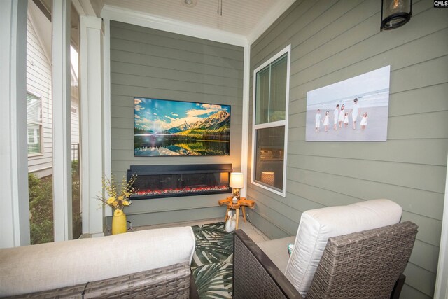221 Coldwater Xing, Lexington, SC 29072 - sunroom featuring a glass covered fireplace