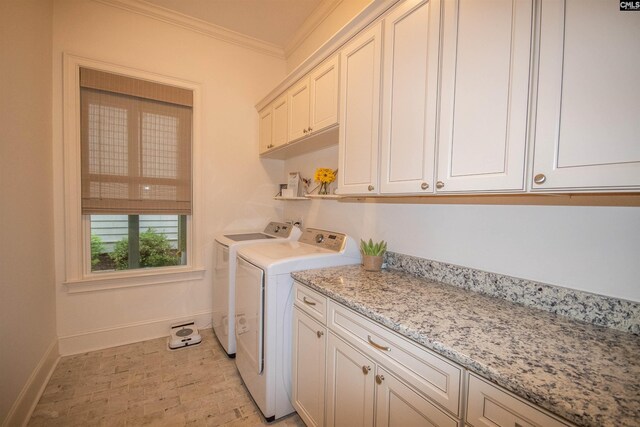 221 Coldwater Xing, Lexington, SC 29072 - laundry area featuring washer and clothes dryer, cabinet space, and crown molding