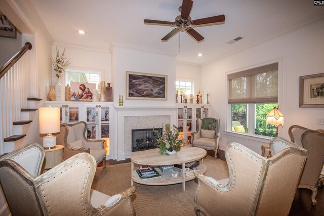 221 Coldwater Xing, Lexington, SC 29072 - living room featuring a ceiling fan, a fireplace, stairs, wood finished floors, and ornamental molding