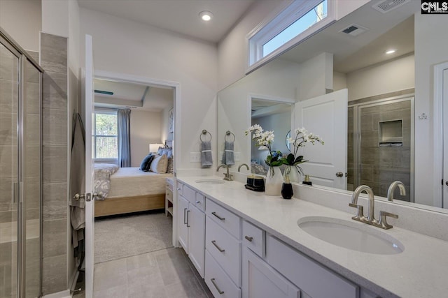 182 Scruple Way, North Augusta, SC 29860 - bathroom with double vanity, a shower stall, connected bathroom, and recessed lighting