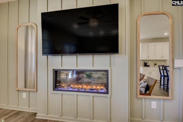 182 Scruple Way, North Augusta, SC 29860 - detailed view of wood finished floors and a glass covered fireplace