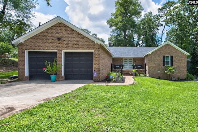 1601 Hagood Ave, Columbia, SC 29204 - view of front of property with brick siding, a front lawn, driveway, french doors, and an attached garage