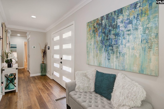 1601 Hagood Ave, Columbia, SC 29204 - foyer featuring recessed lighting, wood finished floors, and ornamental molding