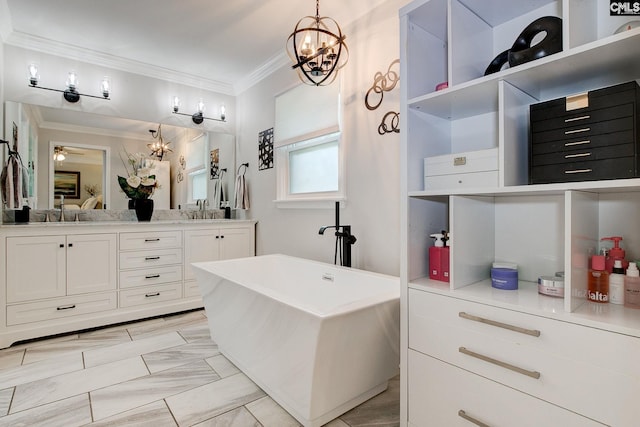1601 Hagood Ave, Columbia, SC 29204 - bathroom featuring a chandelier, a soaking tub, crown molding, and double vanity