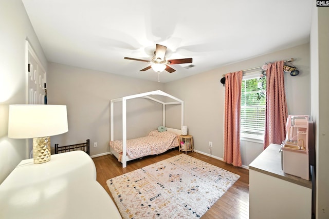 100 Morning Echo Dr, Columbia, SC 29229 - bedroom with wood finished floors and a ceiling fan