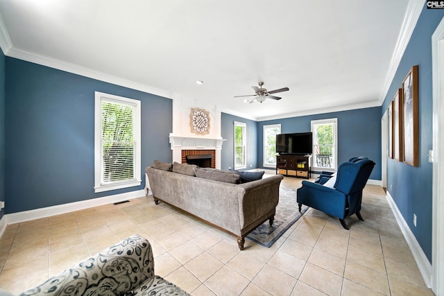 100 Morning Echo Dr, Columbia, SC 29229 - living room with ornamental molding, plenty of natural light, a fireplace, light tile patterned floors, and ceiling fan