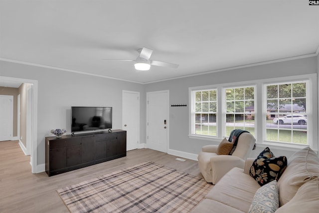 608 Byron Rd, Columbia, SC 29209 - living area with crown molding, ceiling fan, and light wood-style floors