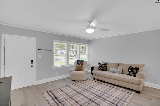 608 Byron Rd, Columbia, SC 29209 - living room featuring light wood finished floors, crown molding, and ceiling fan