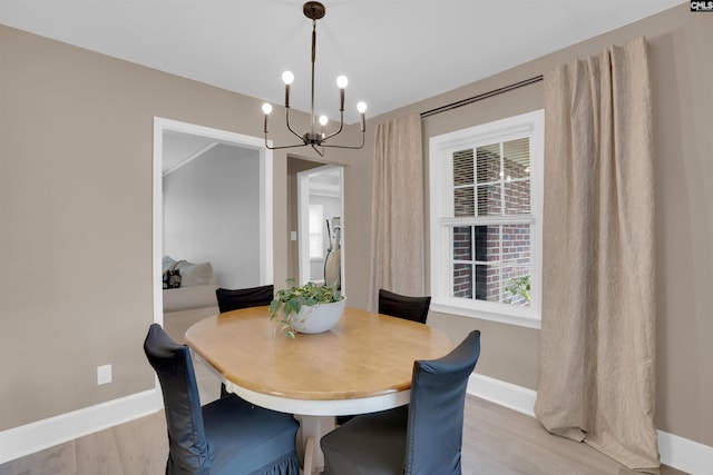 608 Byron Rd, Columbia, SC 29209 - dining space with a chandelier, light wood-style floors, and plenty of natural light