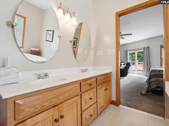 887 Living Waters, Great Falls, SC 29055 - ensuite bathroom featuring double vanity, a ceiling fan, and tile patterned floors