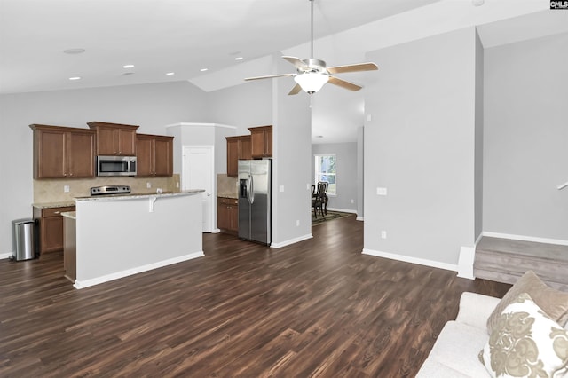 821 Burnview Ln, Chapin, SC 29036 - kitchen with stainless steel appliances, a ceiling fan, dark wood-style floors, decorative backsplash, and recessed lighting