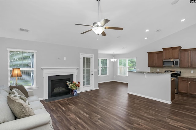 821 Burnview Ln, Chapin, SC 29036 - unfurnished living room with ceiling fan, dark wood-type flooring, a fireplace with flush hearth, recessed lighting, and lofted ceiling