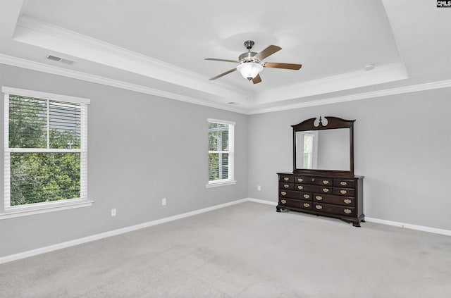 821 Burnview Ln, Chapin, SC 29036 - unfurnished bedroom with a raised ceiling, ornamental molding, carpet flooring, and a ceiling fan